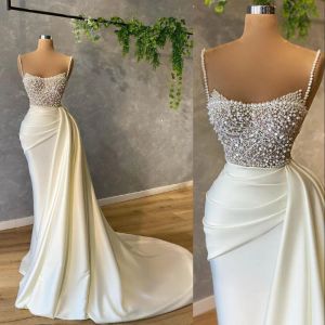 Sexy Arabic Mermaid White Evening Dresses Wear Spaghetti Straps Sleevelesss Crystal Beads Pearls Satin Formal Prom Gowns Party Gowns Sweep Train