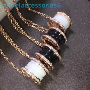 2024 Jewelry Designer Brand Pendant Necklaces Meilong Goods Treasure Red Charity Black and White Ceramic Little Man Waist Spring Skirt Necklace