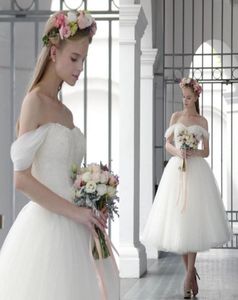 Abiti da sposa estivi in tulle lunghezza tè Una linea con scollo a cuore e spalle scoperte Abiti da festa di nozze per la sposa9811537