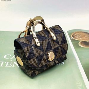 A fábrica vende bolsas de designer de marca on -line a 75% desconto clássico prbyopia couro leve luxuoso vento mini grande bolsa de bolsa de carteira