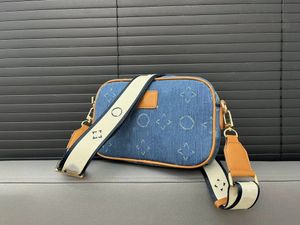 24SS Mäns lyxdesigner denim åldras Messenger väska crossbody kameraväska mäns tygväska axelväska mobiltelefon väska handväska 22 cm