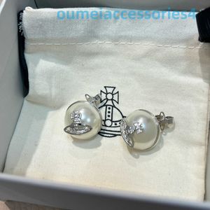 Designer Luxury Brand Jewelry Western Empress DowageRing Stud End Version ~ Niche Sense Saturn West Pearl Womens Earrings 2024 Light