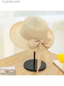 Szerokie brzegowe czapki wiadra czapki 2023 NOWOŚĆ Summer Str Womens Hat Składany brzeg mody Bow Str Hat Women Outdoor Suncreen Beach Str Hat Y240320