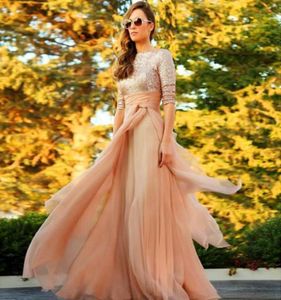 Nya Bateau -paljetter Topphalva ärmar Långt en linje Tulle prom klänningar Vestidos Longo Saudiarabien ruffle Empire Evening Gowns Party D7856376