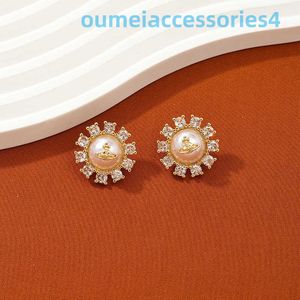 Designer-Luxusmarkenschmuck Western Empress Dowagerring aus 925er Silber mit eingelegtem Zirkon und leicht verkupferten runden Perlenohrringen aus 18 Karat Gold