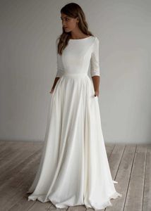 2021 Скромное свадебное платье из крепа трапециевидной формы с длинными рукавами и карманами со шлейфом. Простые элегантные неформальные свадебные платья в стиле бохо с рукавами на заказ.