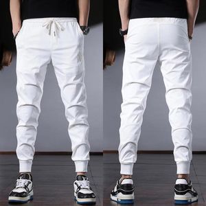 Pantaloni da uomo estivi bianchi sportivi da uomo moda ricamo pantaloni da jogging con coulisse in vita elastica slim fit