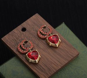 Orecchini pendenti con cuore di amore in cristallo rosso di design, orecchini con lettera da donna, orecchini di marca famosi, accessori per gioielli per feste