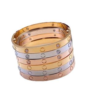 Märke guld män mode par manschett designer för kvinnor hög kvalitet 316l rostfritt stål armband smycken