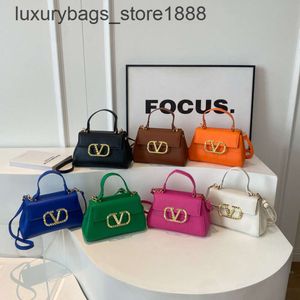 Crossbody väska designer bästsäljande varumärke kvinnors väskor fashionabla väska ny enkel mönster handväska mångsidig en axel
