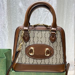 Bolsa feminina designer bolsa de ombro de luxo a sacola crossbody saco horsebits ébano lona ouro hardware marrom couro alça superior totes