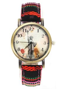 時計高品質の腕時計彫像の自由の彫像デニムファブリックバンドマルチカラーキャンバスストラップクロスベルトファッションユニセックスクォーツリストウォッチ