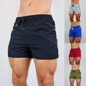 Pantaloncini da uomo da uomo estivi ad asciugatura rapida moda yoga vestibilità ampia allenamento con tasche allenamento uomo