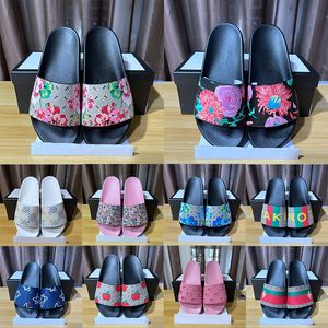 Klassiker sandaler tofflor kvinnor gummi mode sandal män kvinnor g blommor blommor toffel platt skor glidbi designer sandal storlek 35-46