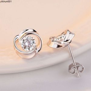 Acessórios de moda femininos mais vendidos simples diamante único branco cobre banhado a platina 925 agulha de prata girando brincos de alta qualidade
