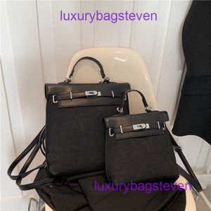 Hremms Kelyys High End Designer Tygväskor för kvinnors stor kapacitet ryggsäck för kvinnor Nytt frostat lapptäcke med high end Feel Crossbody Bag Original 1: 1 med logotyp