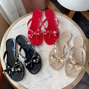 2024 Pantofole da donna estive Qualità classica Scivoli borchiati sandali infradito firmati fiocco mulo Sandali in gelatina da donna tacchi alti Infradito da spiaggia Scarpe Nodo Flats pump