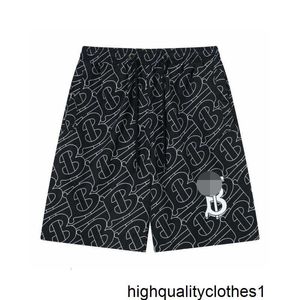 Designer versão correta de shorts casuais de praia para meninos, capris elásticos soltos de verão, calças sanitárias de malha, calças esportivas de perna reta 01J3