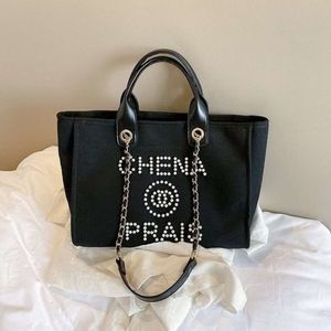 Luxus-Einkaufstasche für Damen, Designer-Handtasche, Strandtasche, großes Fassungsvermögen, Perlenstickerei, Segeltuch-Einkaufstasche, tragbar, hochwertige, klassische Kette, eine Schultertasche