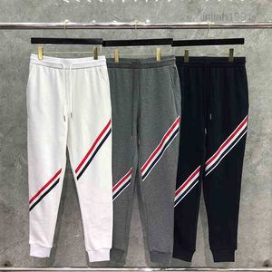 2021 العلامة التجارية للأزياء TB Sweatpants الرجال نساء ربيع الخريف القطن غير الرسمي بنطلون رياضي غير رسمي.