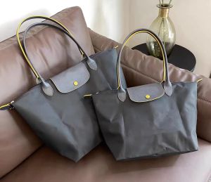 Tygväska Designer Bag Högkvalitativ bärbar dumpling Dumpling Bag Leisure Nylon Handväska Luxury Crossbody Bagg Beach Travel