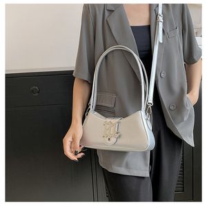 Neue Modetasche Kleine französische minimalistische Damentasche, neue modische und trendige, superheiße Einzelschultertasche, einfarbige, vielseitige Umhängetasche unter den Armen