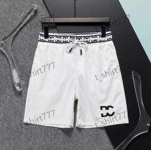 Designer masculino shorts na altura do joelho calças verão férias praia casual solto cintura alta de secagem rápida calças de carta bordada