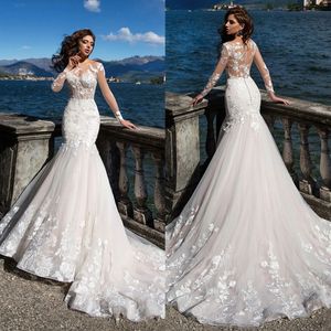 Abiti da sposa sexy da spiaggia a sirena con illusione maniche lunghe Applicazioni in pizzo Vestido De Noiva Sweep Train Tulle Abiti da sposa arabi