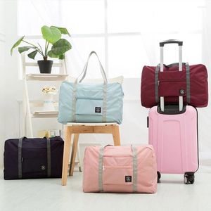 Sacos de armazenamento Bolsa de viagem de grande capacidade Bolsas de bagagem Dobrável Organizador de mala à prova d'água Roupas unissex Tote