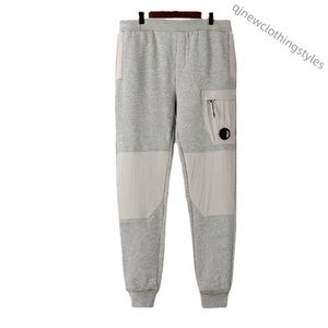 Marka okularka Pocket CP Pant Autumn and Winter Men's Sport Growen Pluszowe Pluszowe Spodnie Trenda marki luźne bawełniane spodnie sanitarne