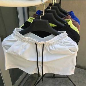 Mäns shorts Summer Sports Elastic Ultra-Thin Quarter Shorts Casual Loose Beach Running Fitness Pants Mens Bottom Mens Clothing J240322