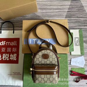 Negozio all'ingrosso Borse firmate Borsa a tracolla Nuovo mini zaino con fiori vecchi Borsa per libri piccola Cerniera portatile con doppia stampa da donna