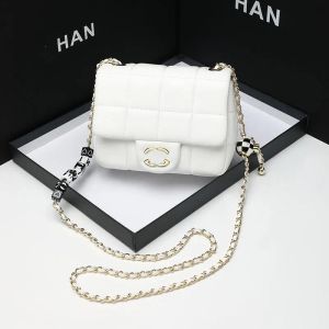 Äkta design läder molnväska ny high-end diamant rutnät kedja påse fashionabla singel axel crossbody väska pendling väska för arbete