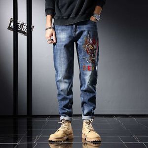 2023 Autumn New Street Men's Jeans with Pixiu Embroidery Trendy Slim Fit Small Feet Elastic Mid Rise Pants for Men