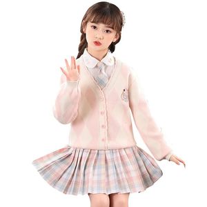 Abbigliamento per ragazze Bambini Primavera e autunno Stile college Stile straniero Ragazze jk Gonna scozzese 3 pezzi Maglione per ragazze Completo scolastico 240307