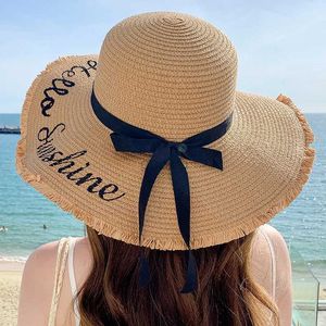 Wide Brim Hats Bucket Hats New Womens Summer Beach Straw Hat Korean Beach Brim Sunblock Sunhade Holiday Fashion Cool Bow Hat 240322
