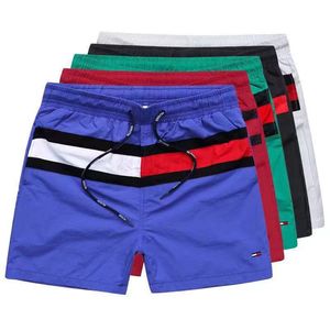 Shorts de natação masculinos shorts bordados de alta qualidade – soltos, casuais, perfeitos para natação esportiva – design unissex para homens e mulheres