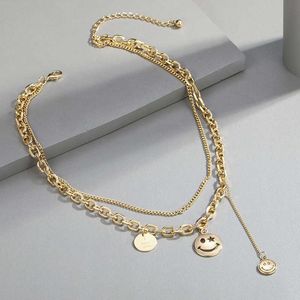 Collana con volto sorridente in metallo KJ per uomo e donna, pendente sorridente a doppio strato, catena hip hop galvanica che preserva il colore