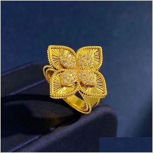 Band Rings Luxury Brand Clover Designer örhängen för kvinnor 18K Gold Sier 4 Löv Flower Crystal Diamond Brincos Earings Earring Ear N OTU2T