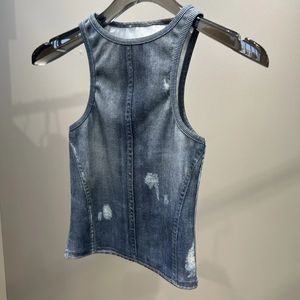 A niche retro vintage distressed neck style washed hole denim camisole top