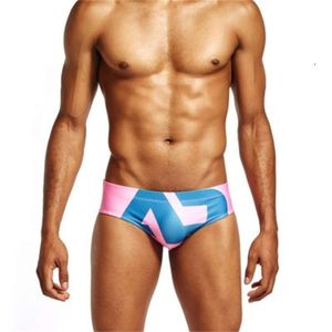 Costume da bagno da uomo a vita bassa Costume da bagno ad asciugatura rapida Costume da bagno da uomo Sexy Gay Slip rosa Costumi da bagno Pantaloncini da spiaggia estivi