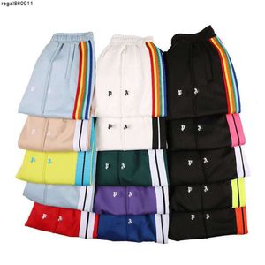 Calças de designer de verão homens mulheres moda lado tecer arco-íris listrado calças soltas sweatpants
