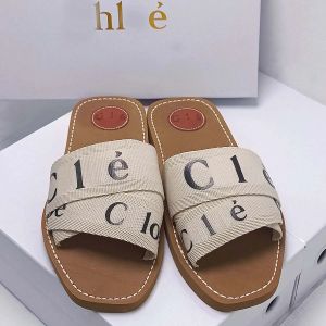 2024 New Designer Slippers Sliders Slides Sandals Woody Flat Mule The Maison's O Signature Adorns the Inner Sole Easy Slip-on Design Makes This Flat a Summer Essentia