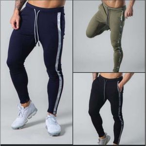 Spring Autumn New Men's Casual Loose Running Training Sports Europe and the United States Patched-foot Pants