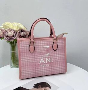 Einfache Canvas-Einkaufstasche für Damen, vielseitige Handtasche mit großem Fassungsvermögen, spezielles Design, fortschrittliche Pendler-Schulter-Messenger-Taschen