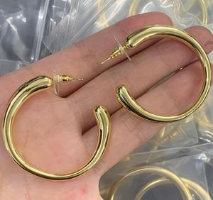 Basit tasarımcı düz daire çember huggie küpe kulaklık 18k altın gümüş kaplama geometri sarkma sarkma aretes orecchini kadınlar için orecchini marka takı aksesuarları