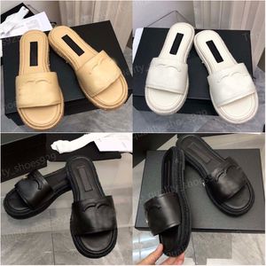 Kvinnliga damer sandaler designer skor halm glider damer sandles fiskare tofflor klassisk platt botten tofflor casual sandaler mode strand slandlar för kvinnor