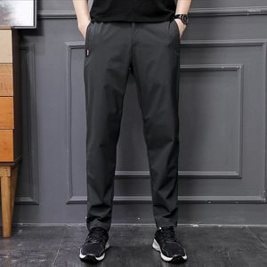 Men's Pants 2024 Trendy Minimalist Spring Autumn Solid Color Elastic Pocket Zipper Small Foot Fitness Versatile Sports Casual