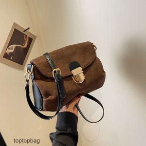 Designer Luxury fashion Tote bags One shoulder womens bag armpit bag 2023 Korean fashion temperament pleated metal lock button stick bag