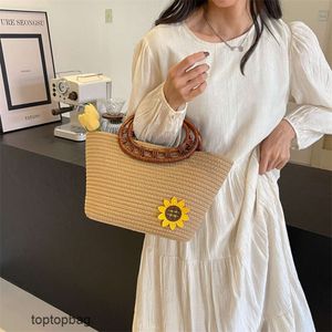 Designer Luxury fashion Tote bags Womens Bag in South Korea New Fashion Handheld Beach Woven Tote Bag Fresh and Sweet Versatile Bamboo Joint Womens Bag